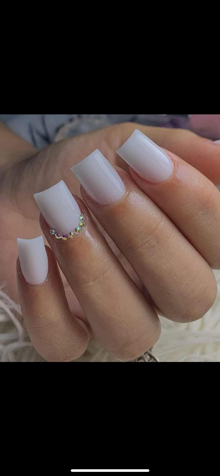 White ombré nails with crystal details
